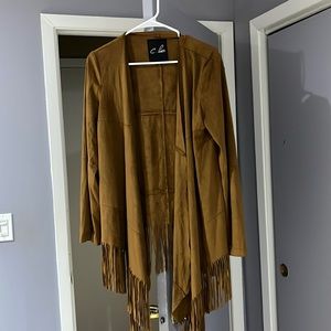 Beautiful suede open jacket with fringes.